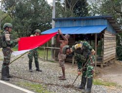 Nuansa Kemerdekaan Mulai Terasa di Tembutka, Satgas Yonif 126/KC dan Warga Bersatu Kibarkan Semangat Merah Putih