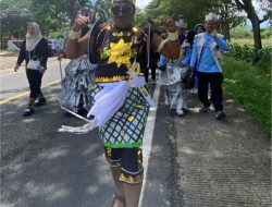 Kepala SD Negeri Tanjung Gading Tampil Beda Kenakan Kostum Gatot Kaca di Pawai Budaya Lampung Selatan Fest 2025