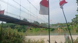 Prajurit TNI Rampungkan Renovasi Jembatan Gantung Garuda, Akses Desa Bandar Kuala Kembali Pulih