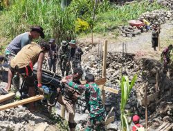 Kodim 1714/PJ Rampungkan Jembatan Beton Merah Putih Tahap VII di Kampung Kulok Enggame